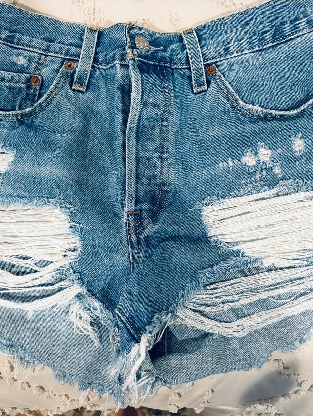Levi's Distressed Light Blue Denim Cutoff Shorts